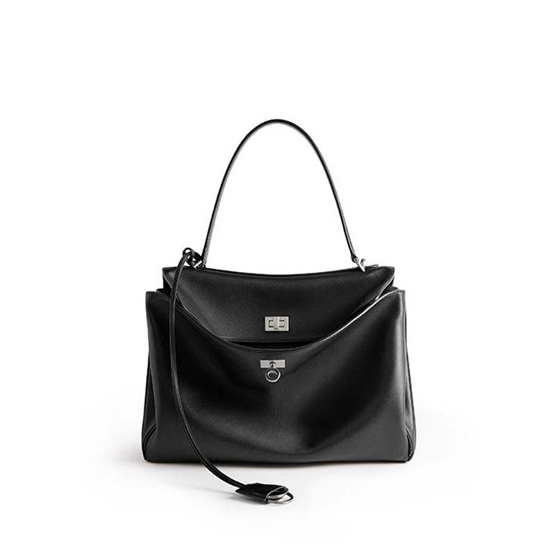 THE TRI-COMPARTMENT EXECUTIVE FLAP BAG